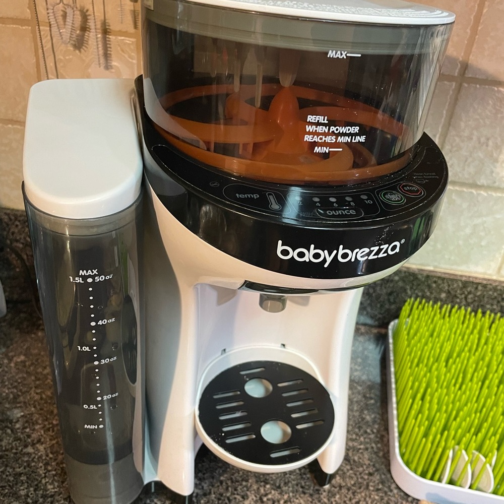 Baby breeza bottle warmer and formula maker